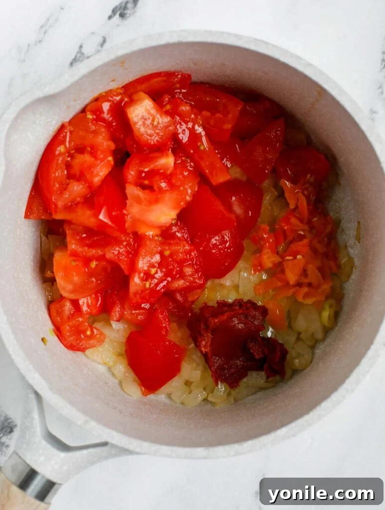 Top down shot of mixing sauce ingredients in a bowl.