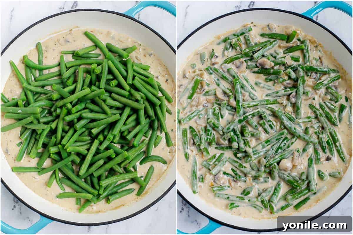 Blanched green beans fully submerged and coated in the creamy mushroom sauce, ready for the next step.
