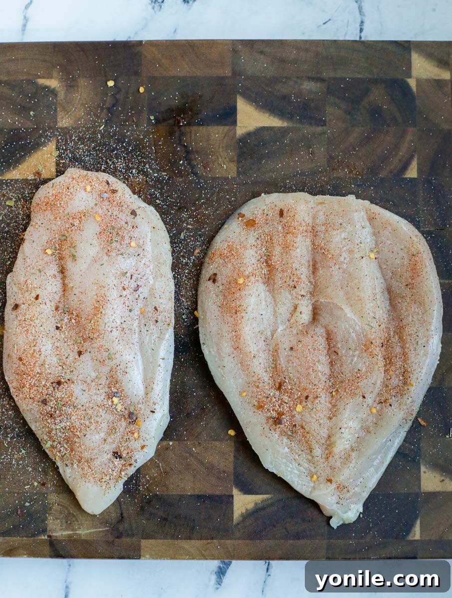 Chicken breast with seasoning.