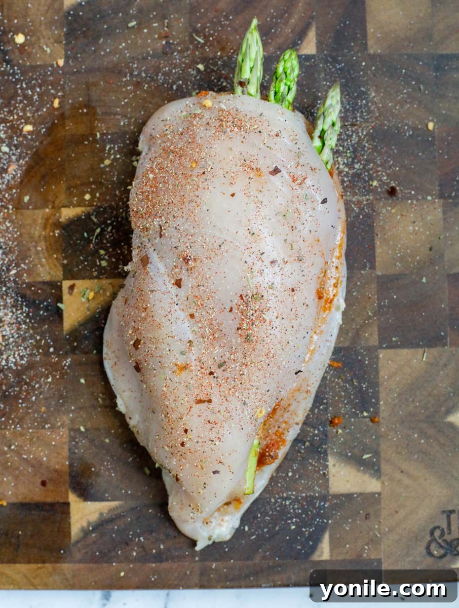 Raw, stuffed chicken breast.