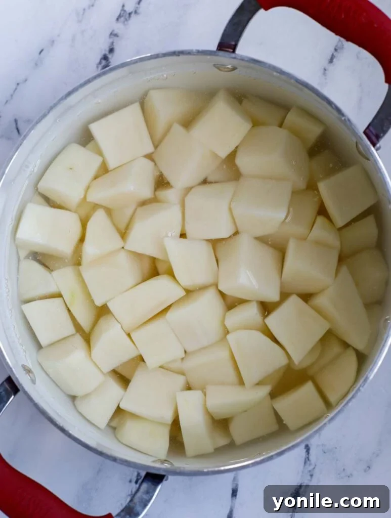 Diced potatoes in a pot.