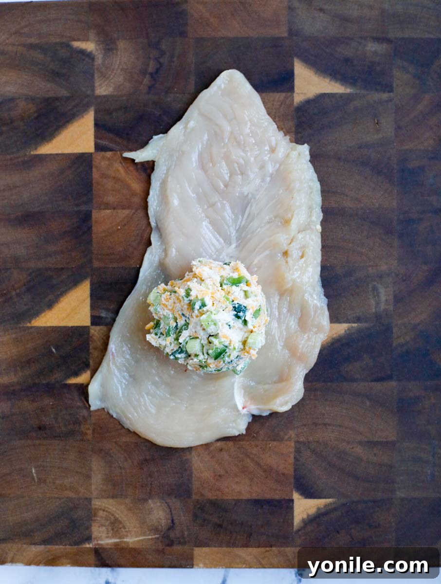 Creamy Jalapeño Chicken Popper 7 Flattened chicken breast with a scoop of creamy jalapeno stuffing.