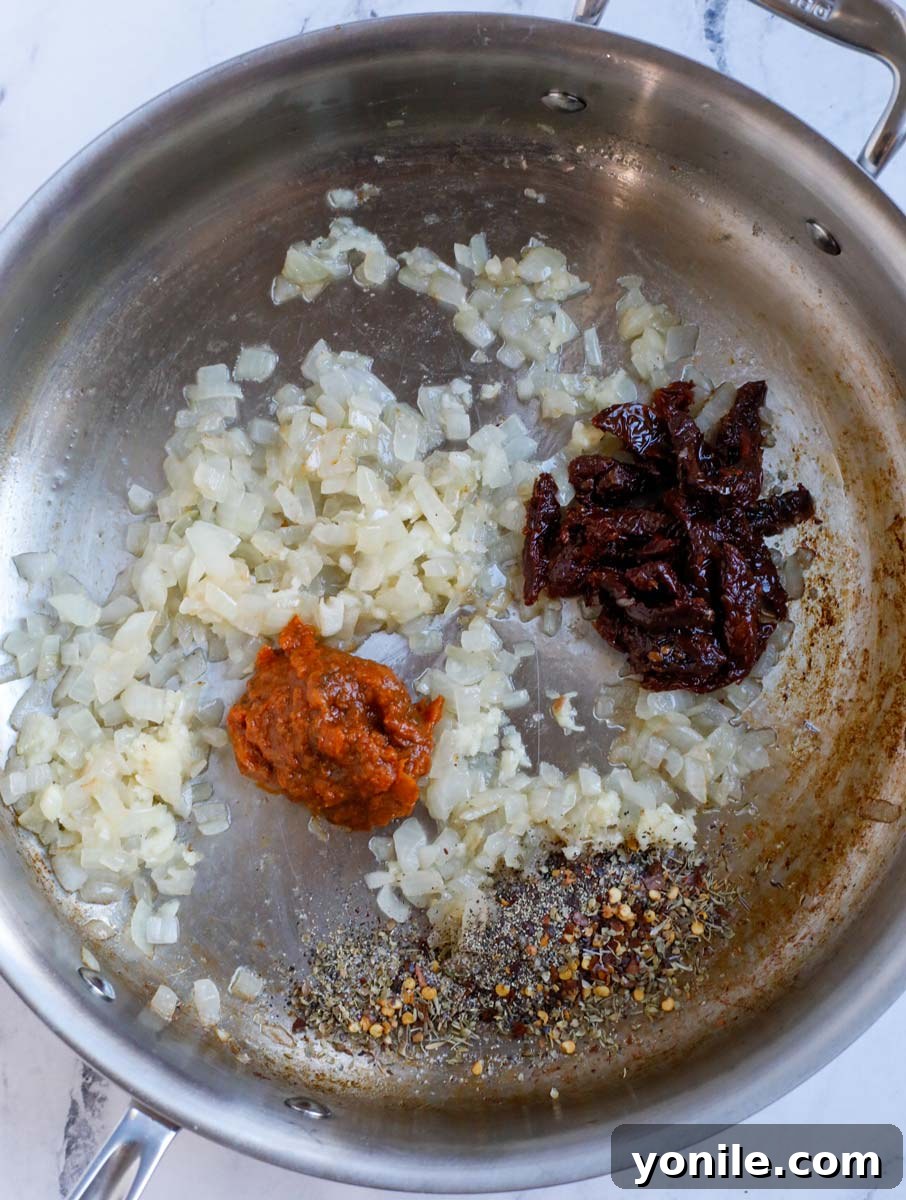 Garlic and spices in a skillet.