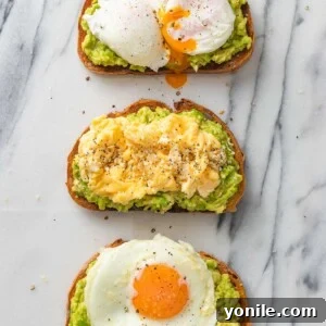 The Perfect Avocado and Egg Toast 8 Three avocado toasts topped with fried, scrambled and poached egg.