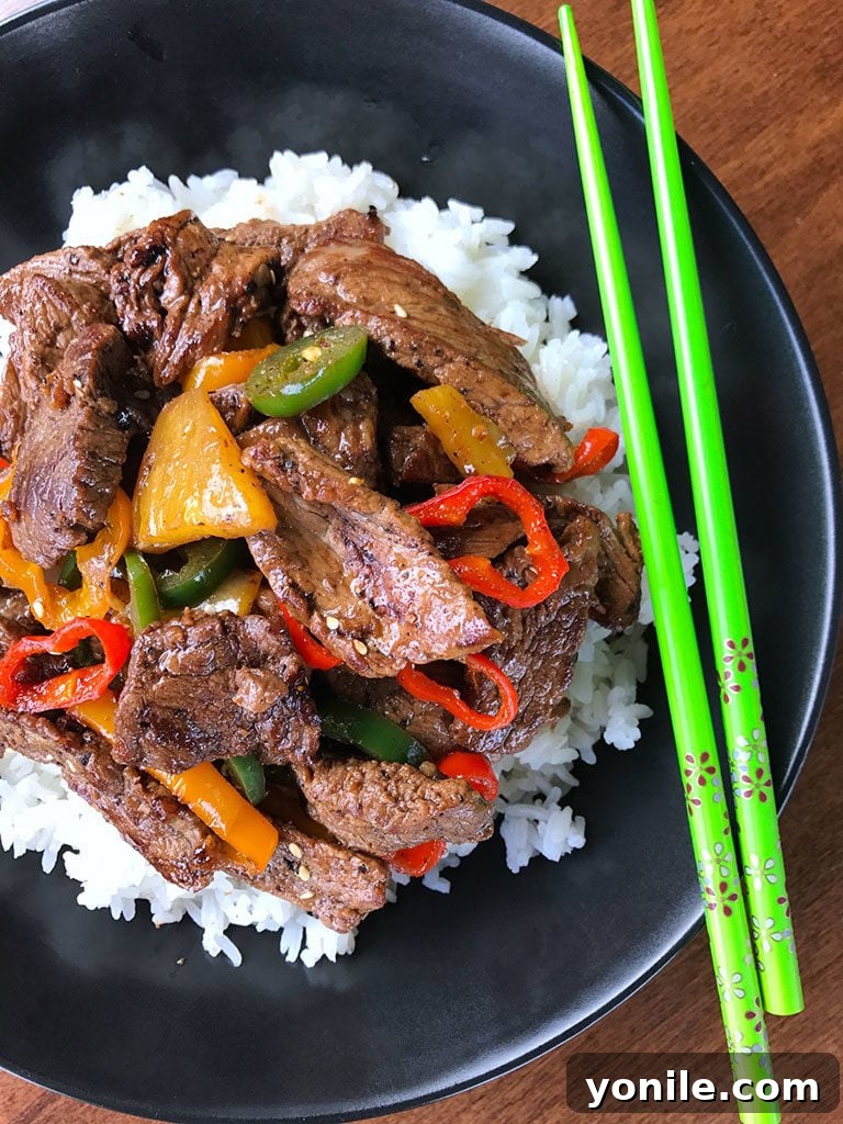 Sweet and Zesty Pineapple Pepper Steak 2 Delicious Pineapple Pepper Steak Stir Fry with tender beef, vibrant bell peppers, and fresh pineapple chunks