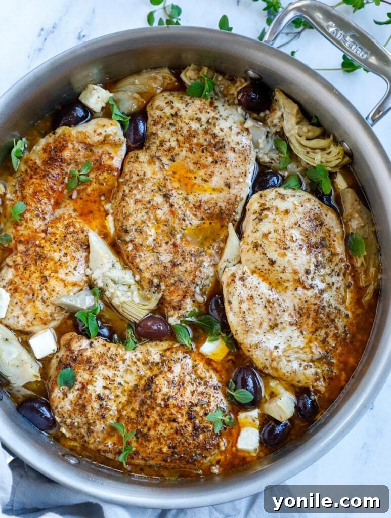 Zesty Greek Skillet Chicken 2 Top down shot of greek chicken in a skillet.