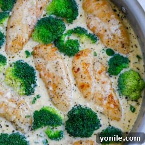 Overhead shot of chicken and broccoli in a pan.