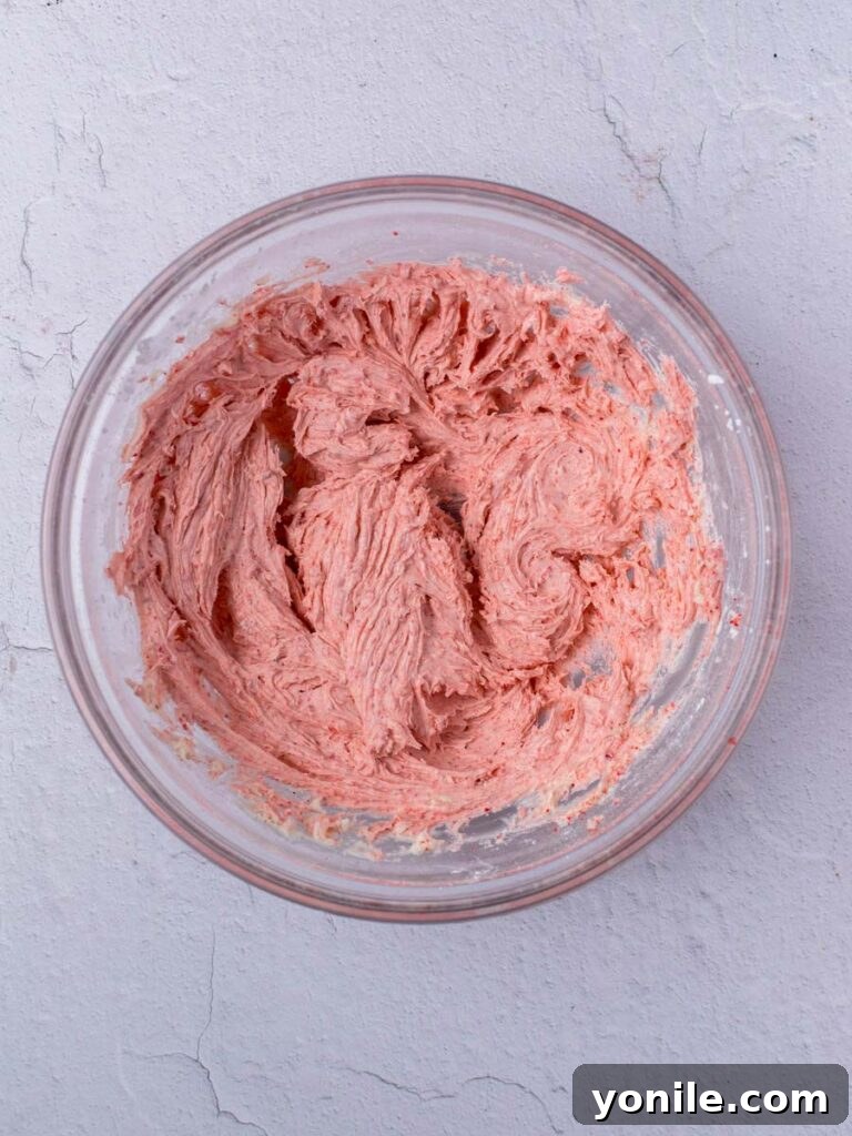 Blushing Strawberry Macarons 4 Pink meringue in a bowl, ready for macaronage.