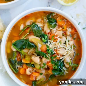 Tuscan white bean soup in a bowl.