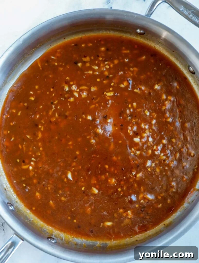 No Fuss General Tsos Chicken 10 Skillet with perfectly thickened general tso sauce, ready for the chicken.