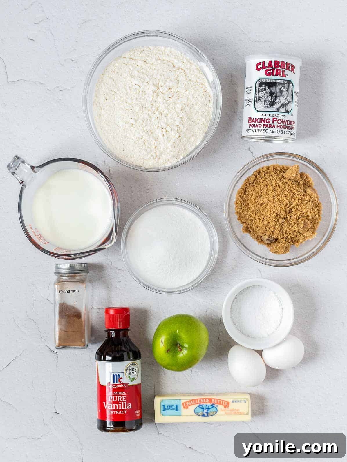 A curated display of fresh ingredients for apple crumb cake, highlighting key components.