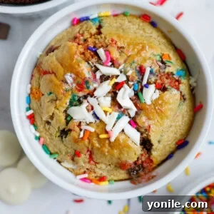 Baked funfetti baked oat with sprinkles on top.