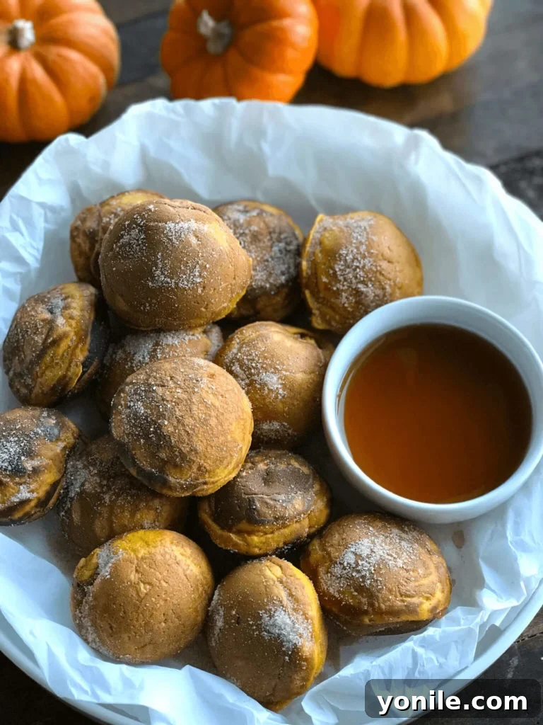 A bowl of freshly made Pumpkin Pancake Bites, ready for topping and serving.