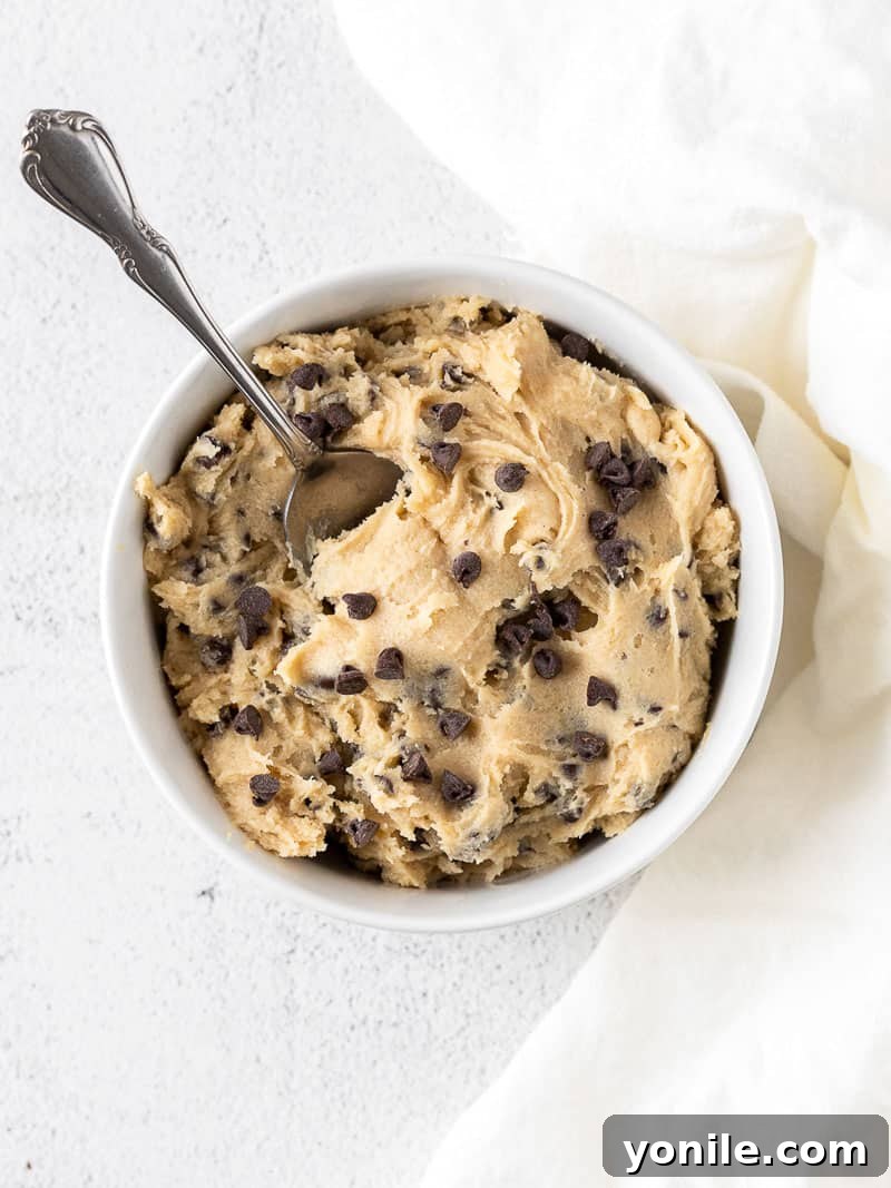 No-Bake Eggless Cookie Dough 6 edible cookie dough in a white bowl with a spoon
