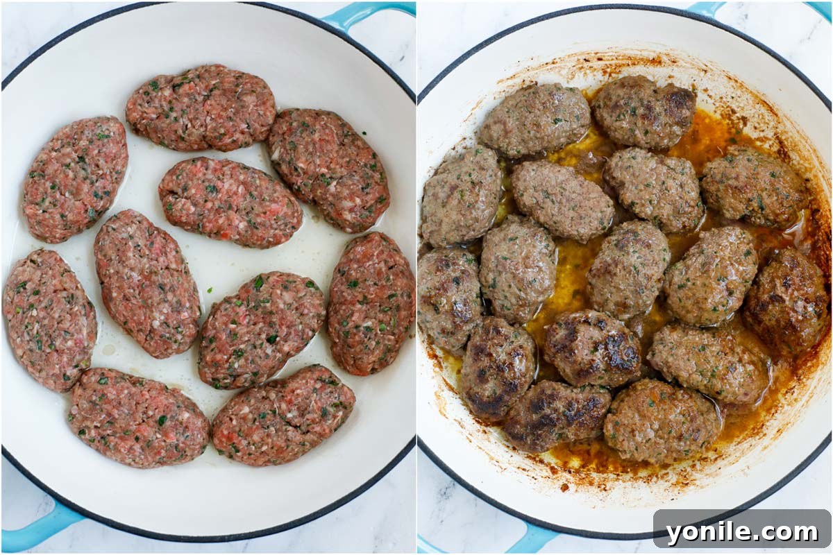 Lebanese Kofta Stew for Beginners 7 Multiple kafta patties being seared to a golden brown in a hot skillet.
