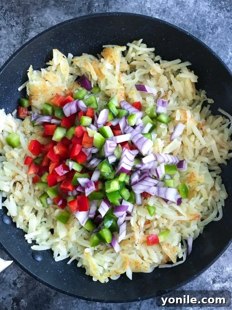 Hashbrowns with Colorful Diced Vegetables Cooking