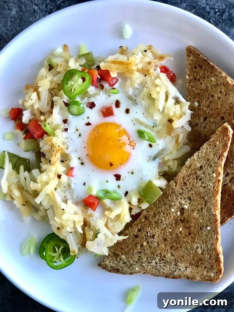 Finished Veggie Hashbrowns with Eggs and Garnishes