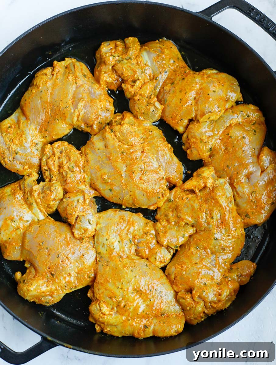 Chicken shawarma in a cast iron before cooking