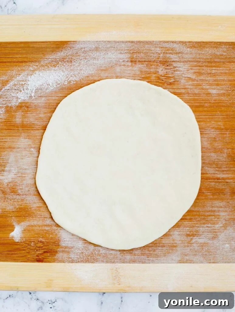 Aromatic Zaatar Flatbread 9 A perfectly rolled out dough portion, ready for topping