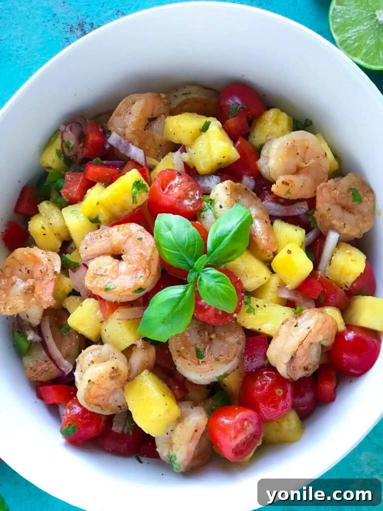 Overhead shot of Pineapple Shrimp Salad in a large serving bowl