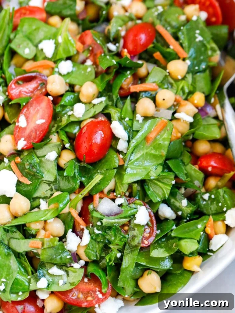Another close-up of the delicious and healthy chickpea spinach salad, ready to be enjoyed.