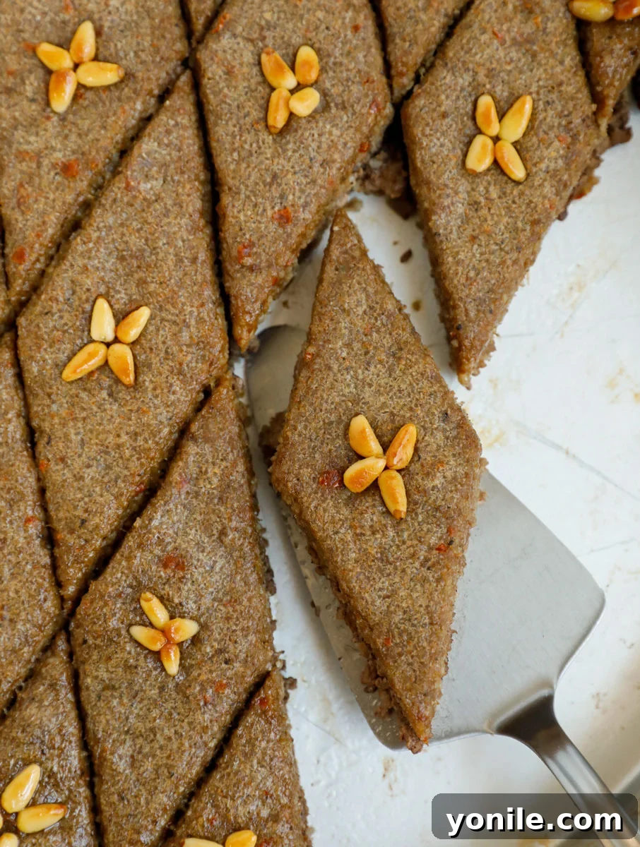 Classic Lebanese Baked Kibbeh 2 top down final shot of baked kibbeh showing one piece of kibbeh