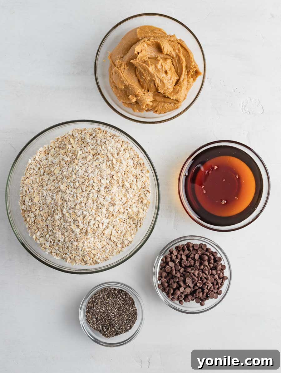 Effortless Energy Bites 3 All the wholesome ingredients for No-Bake Energy Balls laid out on a kitchen counter.
