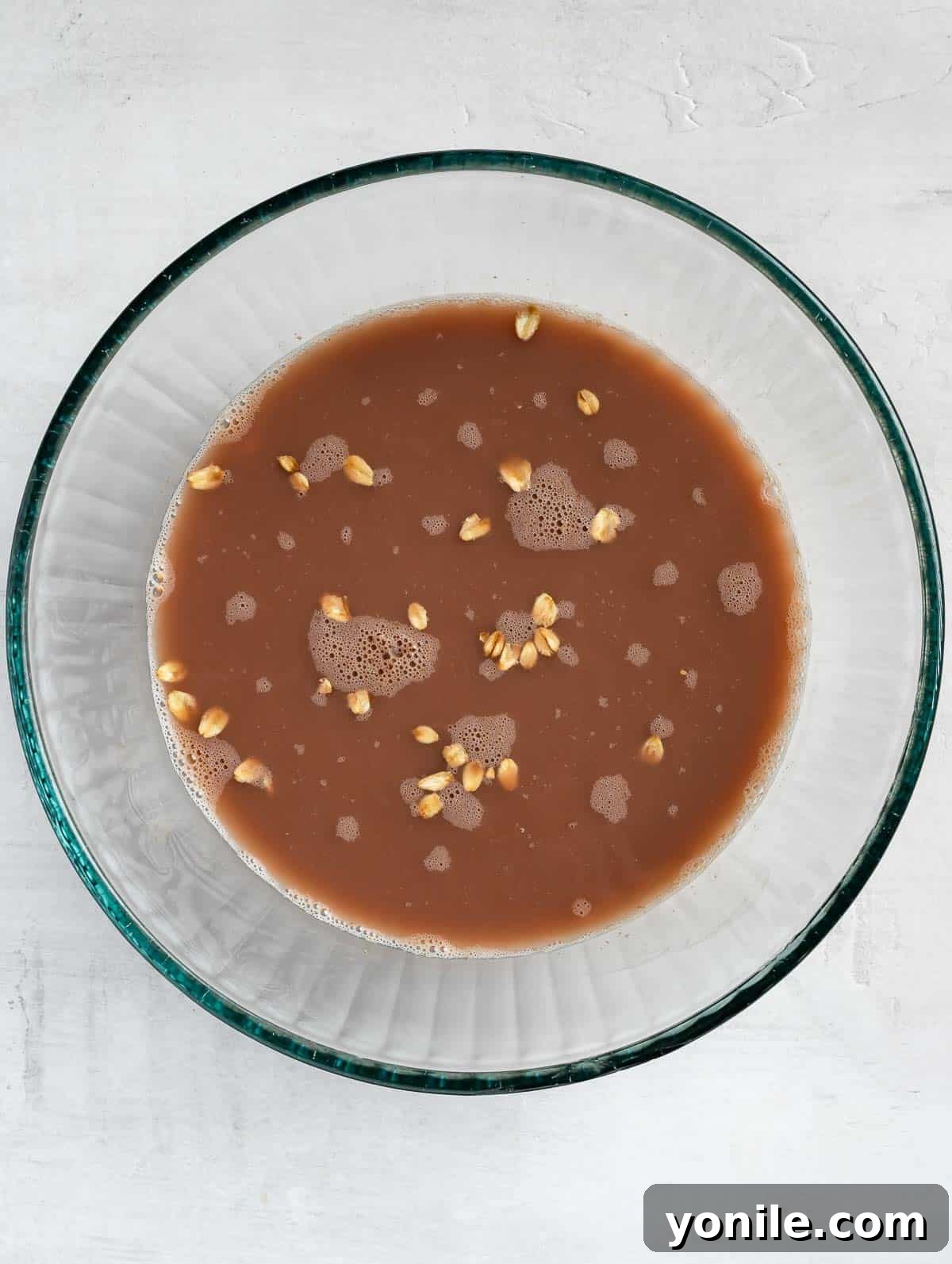 Cocoa Peanut Butter Bliss Bowl 3 chocolate oats ingredients in a bowl before leaving overnight