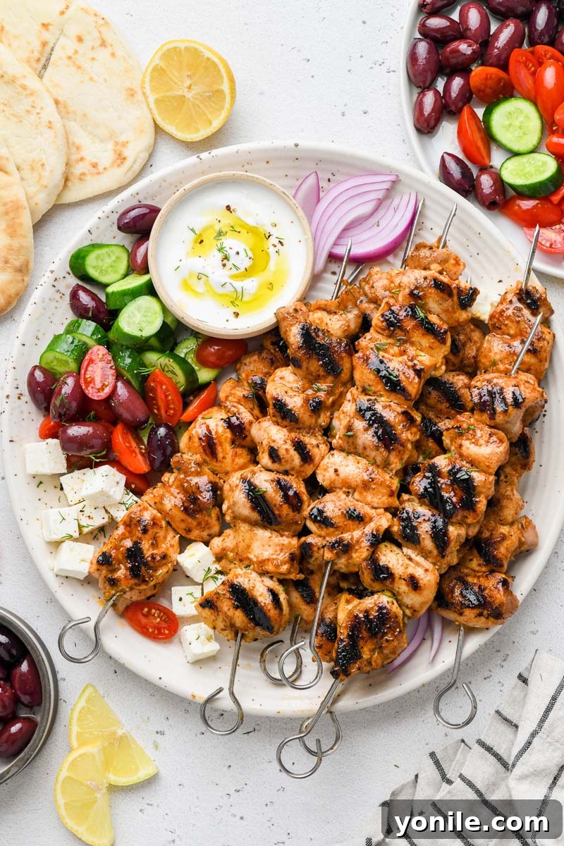 Zesty Lemon Garlic Chicken Skewers 2 top down shot of the lemon garlic chicken skewers styled on a plate