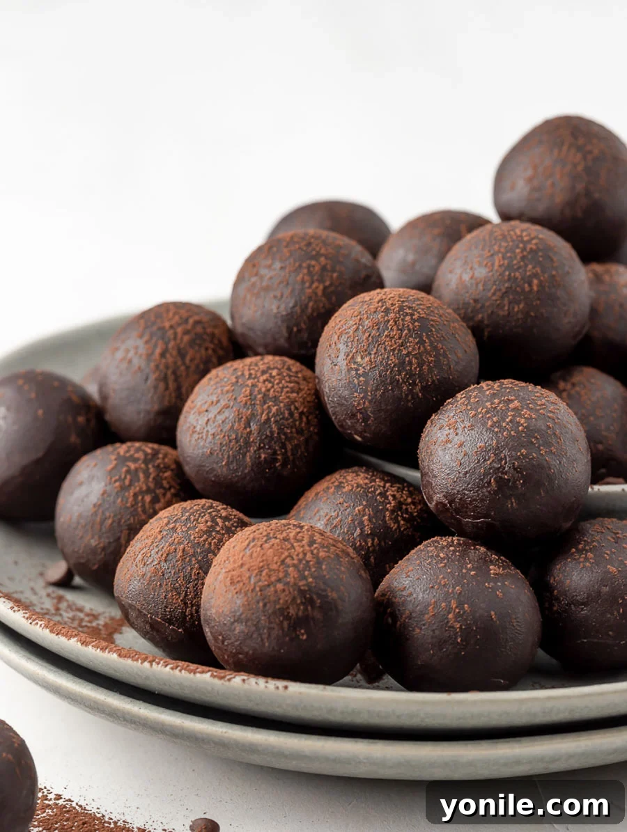 Close up shot of delicious no-bake brownie energy bites, rich in chocolate flavor and perfect for a quick snack.