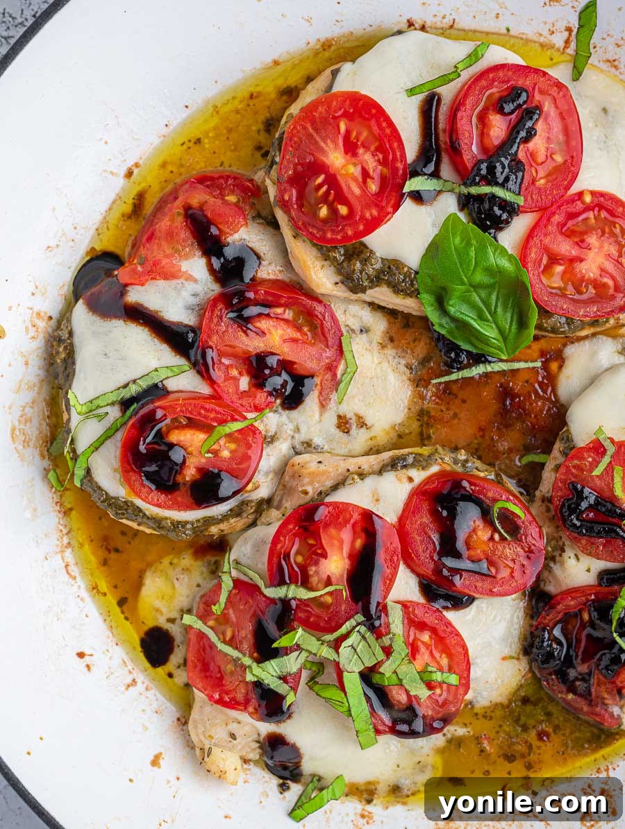 top down shot of caprese chicken skillet