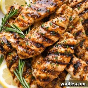 Close up of a plate of grilled honey mustard chicken.