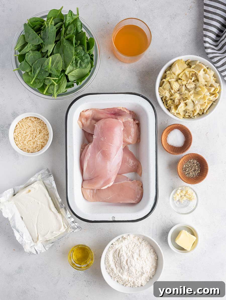 ingredients of spinach artichoke chicken laid out