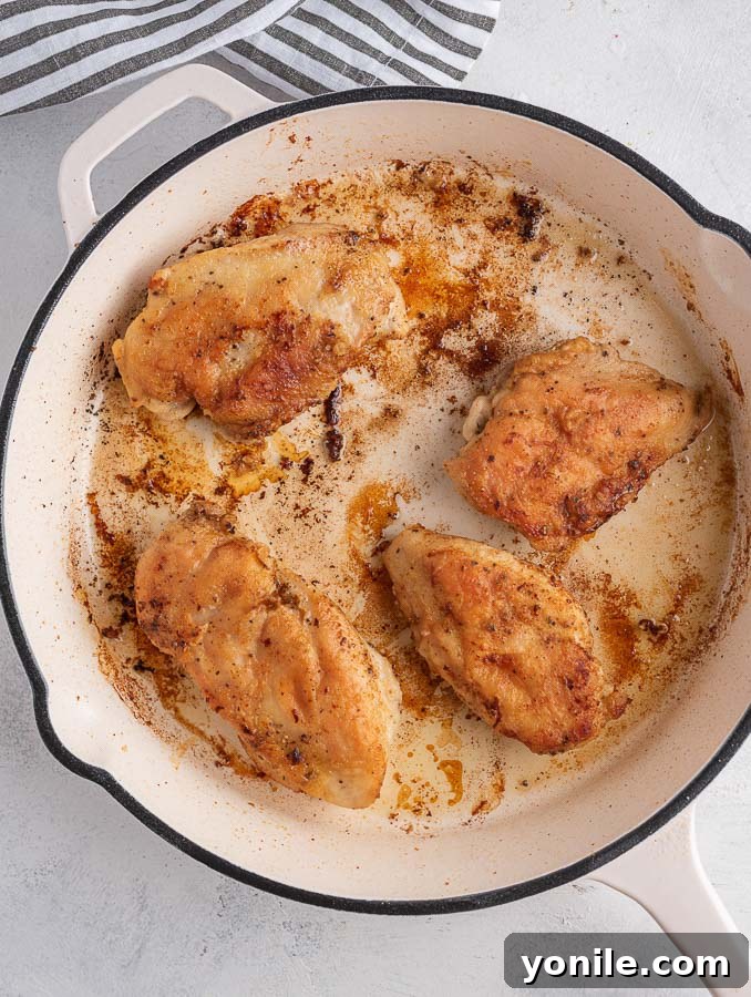 pan seared chicken in a skillet