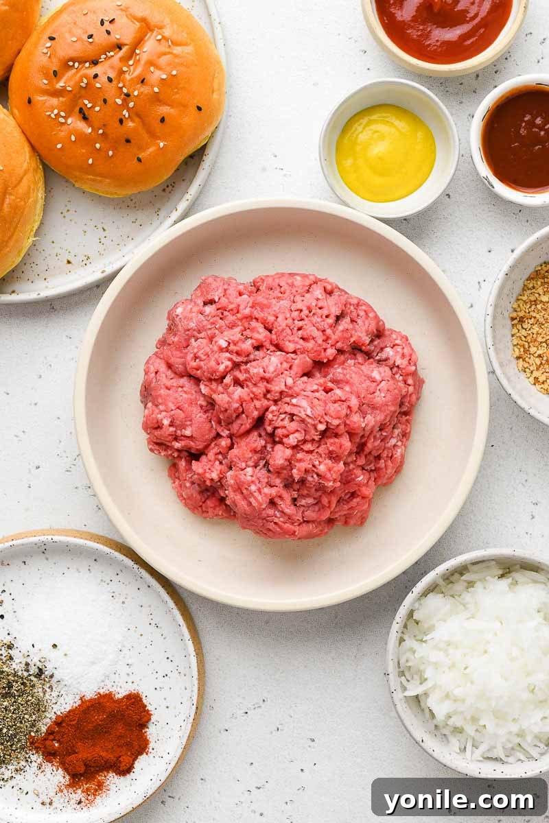Gourmet Burgers at Home 3 All the fresh ingredients meticulously laid out on a kitchen surface, ready for making homemade burgers.