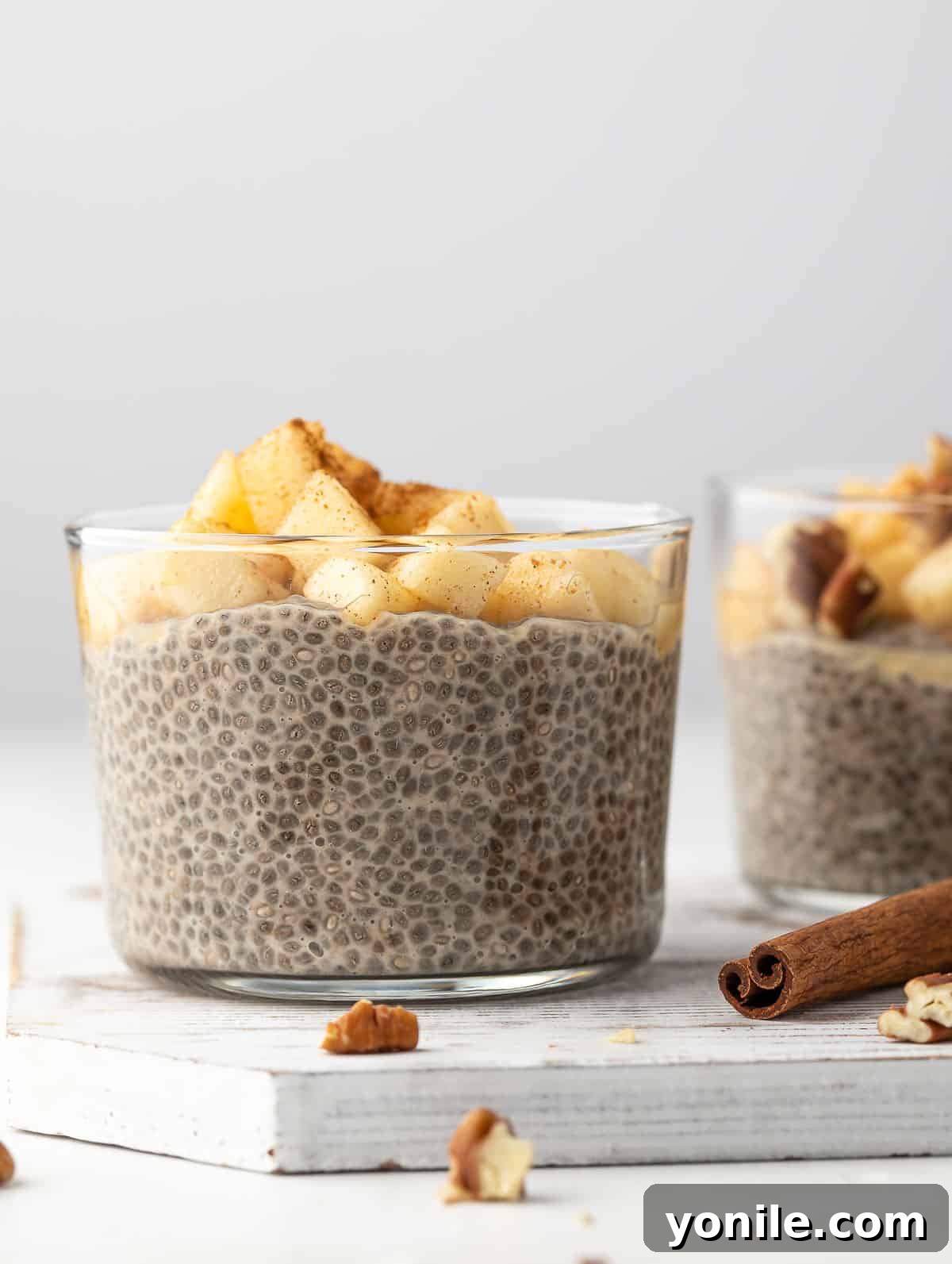Creamy Overnight Chia Pudding topped generously with fresh diced apples and a sprinkle of cinnamon, ready for a healthy and delicious breakfast.