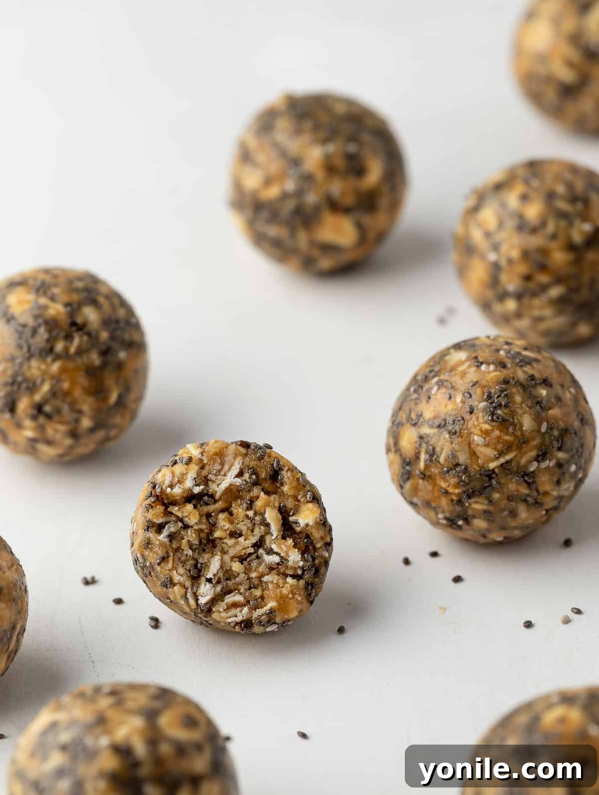Vanilla Fuel Bites 9 close up shot of one energy ball, with a bite taken care of it