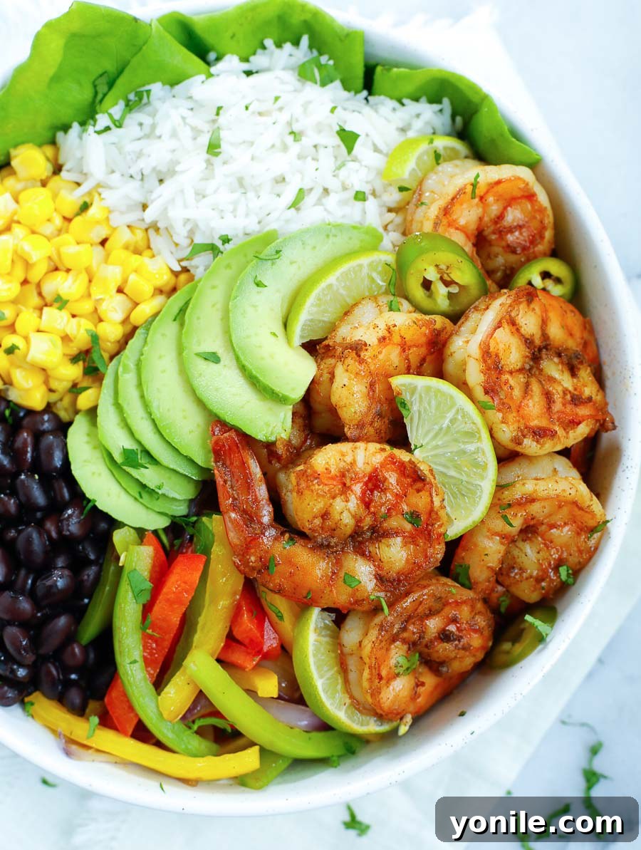 A close-up shot of the mouthwatering Healthy Chipotle Shrimp Bowl, highlighting the textures and vibrant colors of the ingredients.