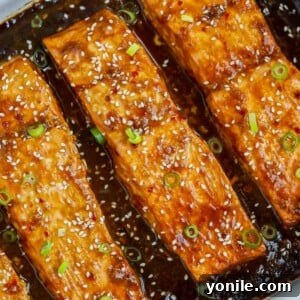 Golden Teriyaki Salmon Bake 8 Baked teriyaki salmon in a baking dish, perfectly glazed.