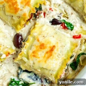 close up shot of a Greek White Alfredo Lasagna roll