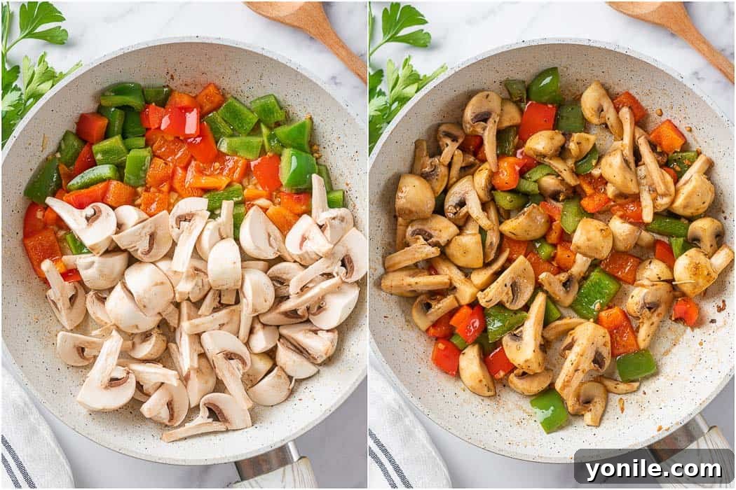 Sizzling Garlic Butter Mushroom Chicken Bites 5 Sautéed bell peppers and mushrooms ready for the cooked chicken to be returned to the skillet.