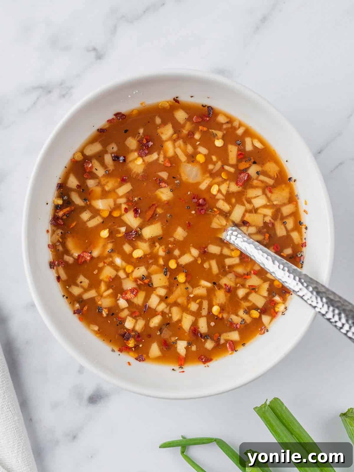 A bowl containing the mixed Szechuan sauce, ready for the stir-fry.