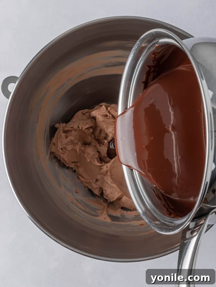 melted chocolate being mixed into the silk filling
