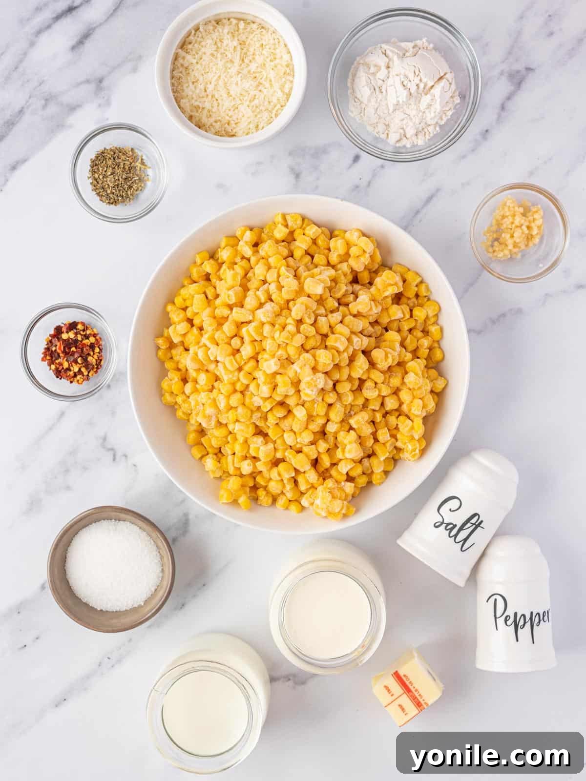 ingredients of creamed corn casserole laid out on a table