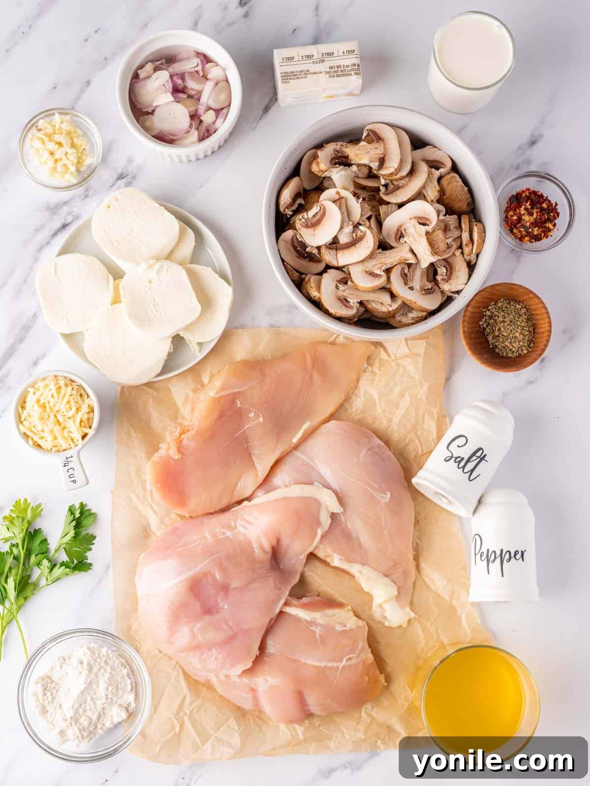 Ingredients needed to make stuffed chicken breast with mushrooms.