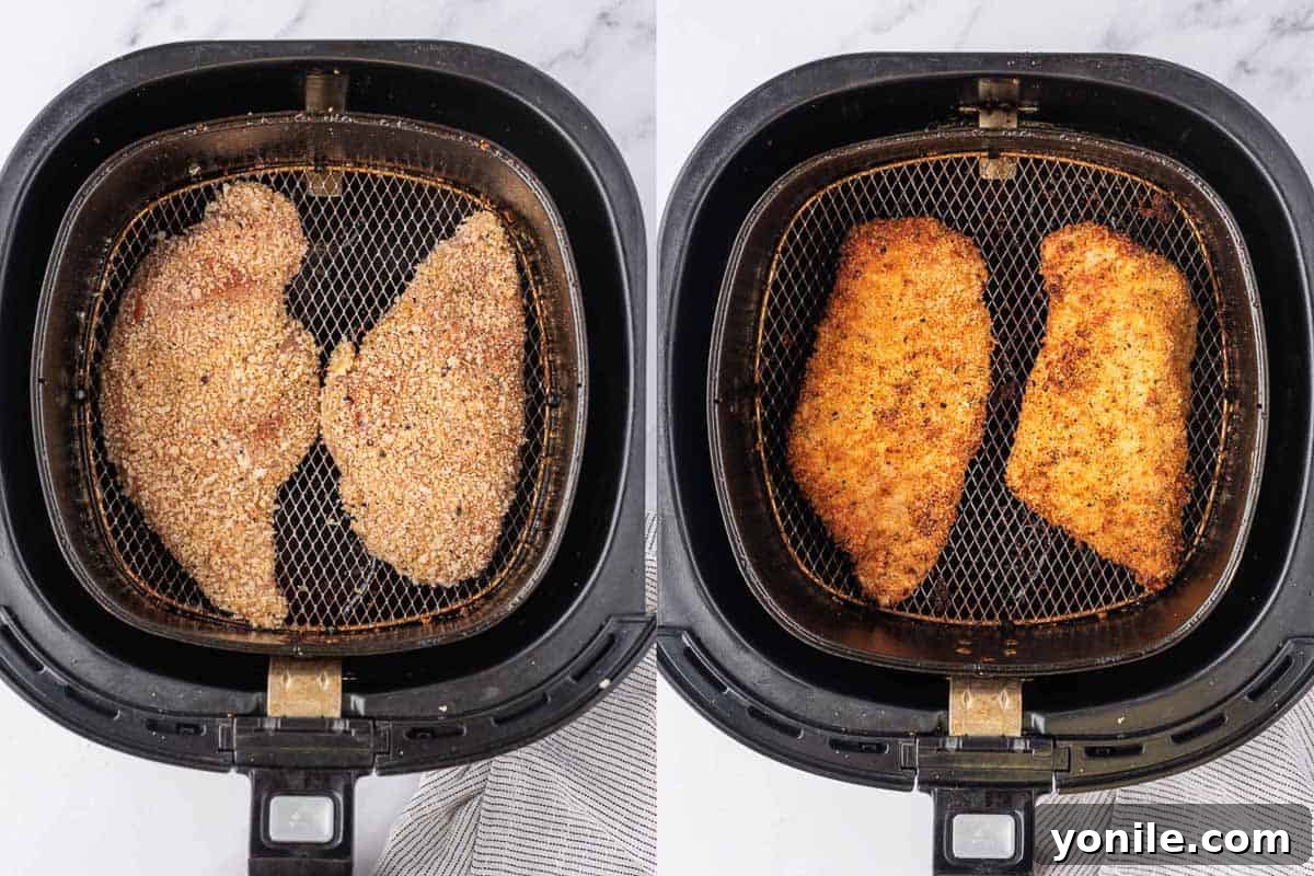 Crispy Air Fryer Chicken Cutlets 5 Crispy breaded chicken cutlets cooking inside an air fryer basket, showing their golden-brown color.