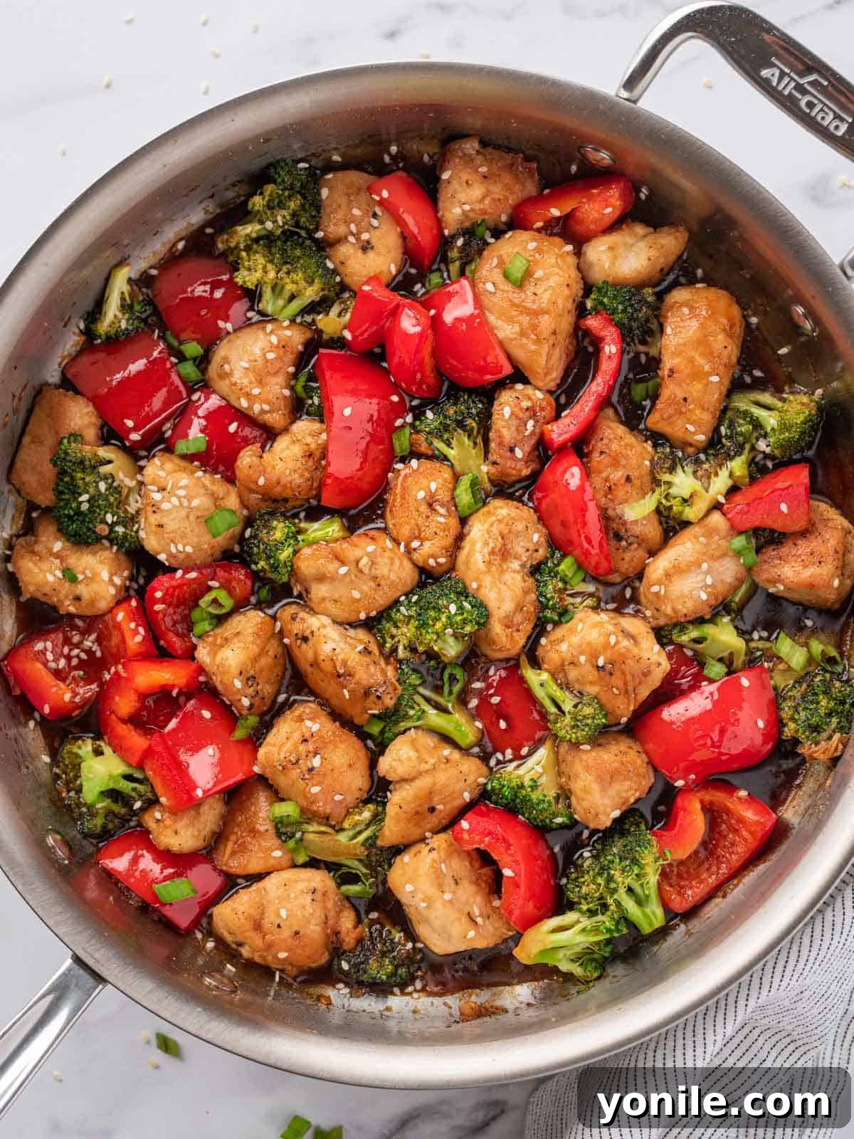 Finished skillet of chicken teriyaki stir fry.