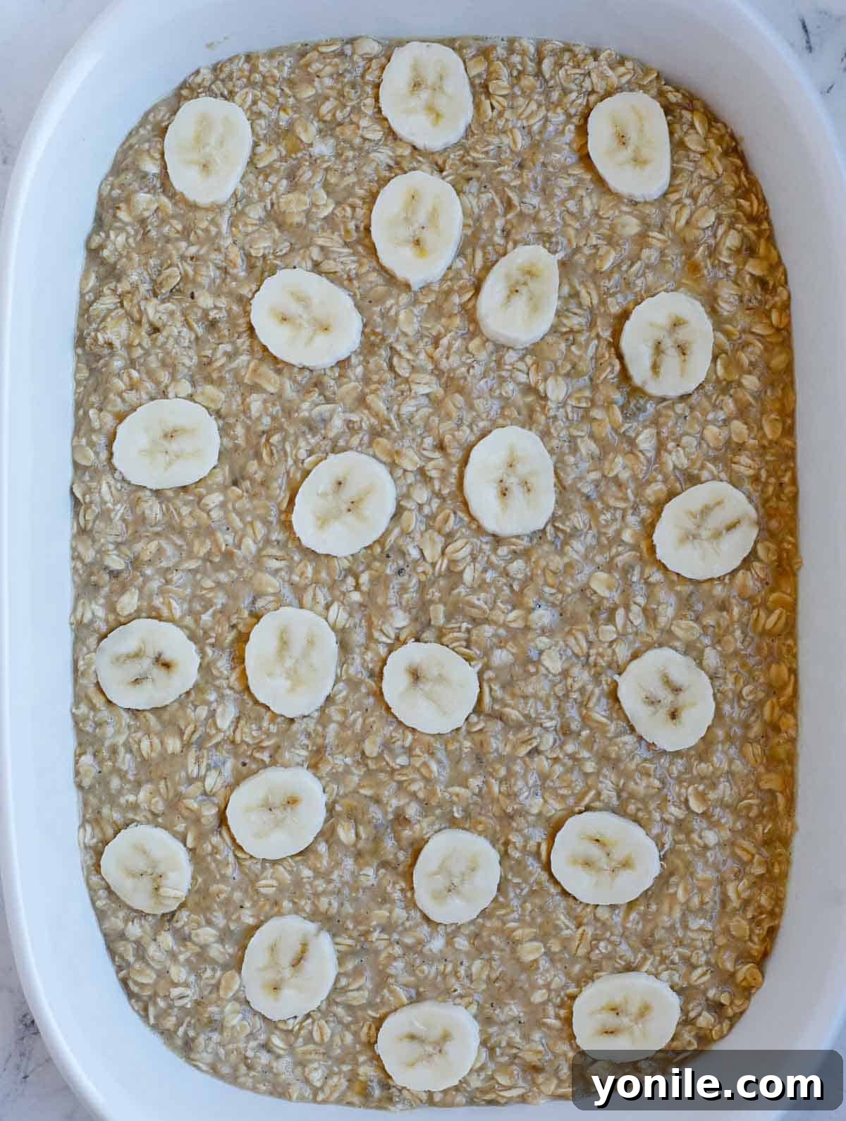 Place bananas on top of the Baked Peanut Butter Oatmeal.