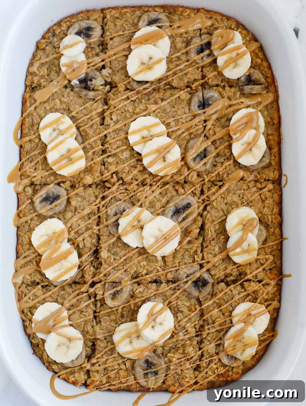 Peanut butter banana baked oatmeal in a dish. 