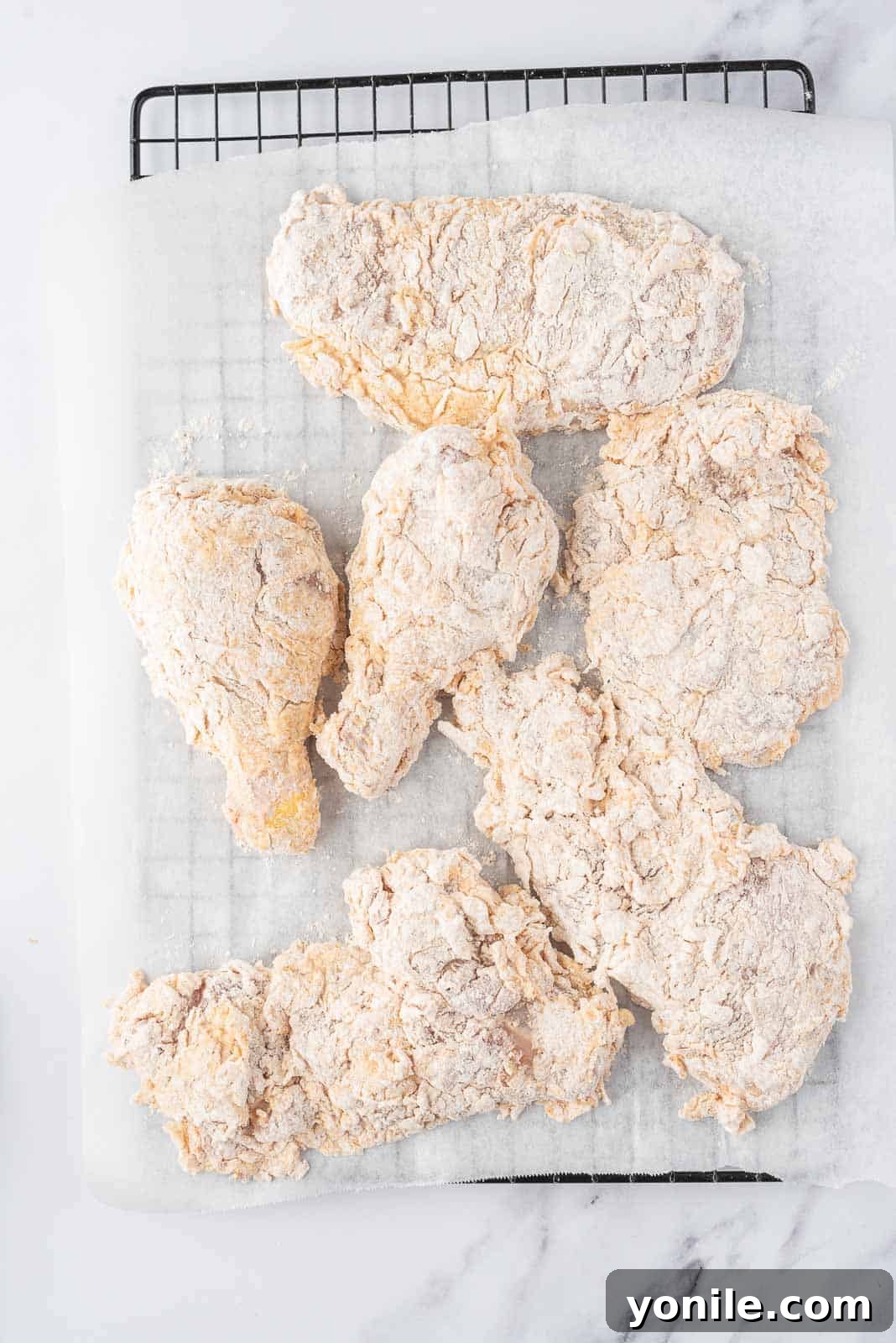 Dredged chicken waiting to be fried.